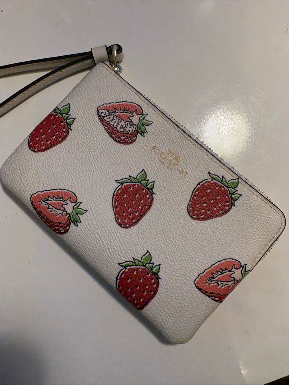 Coach White Pebbled Leather Strawberry Wristlet